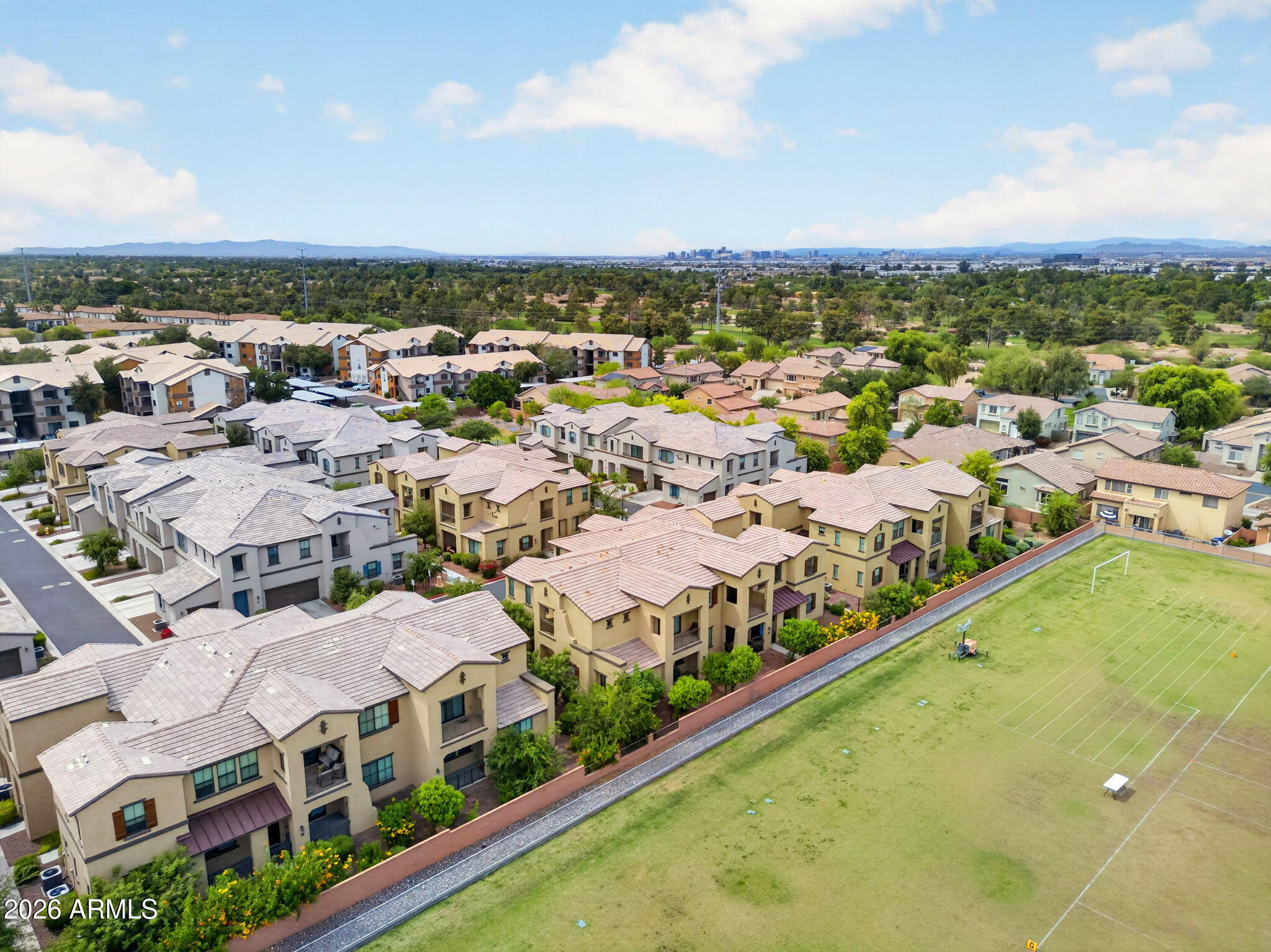 3900 East Baseline Road, Unit 149 Phoenix, AZ 85042 - Photo 49 of 54 a view of a city with tall buildings