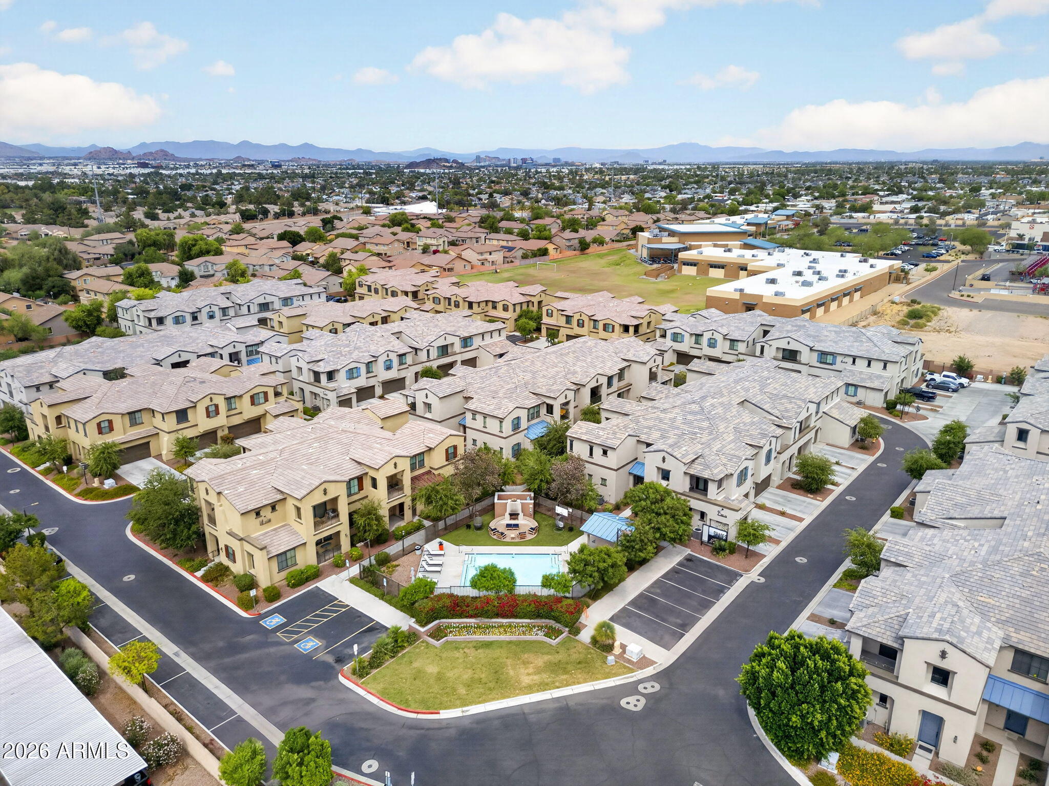 3900 East Baseline Road, Unit 149 Phoenix, AZ 85042 - Photo 52 of 54 an aerial view of residential houses with outdoor space
