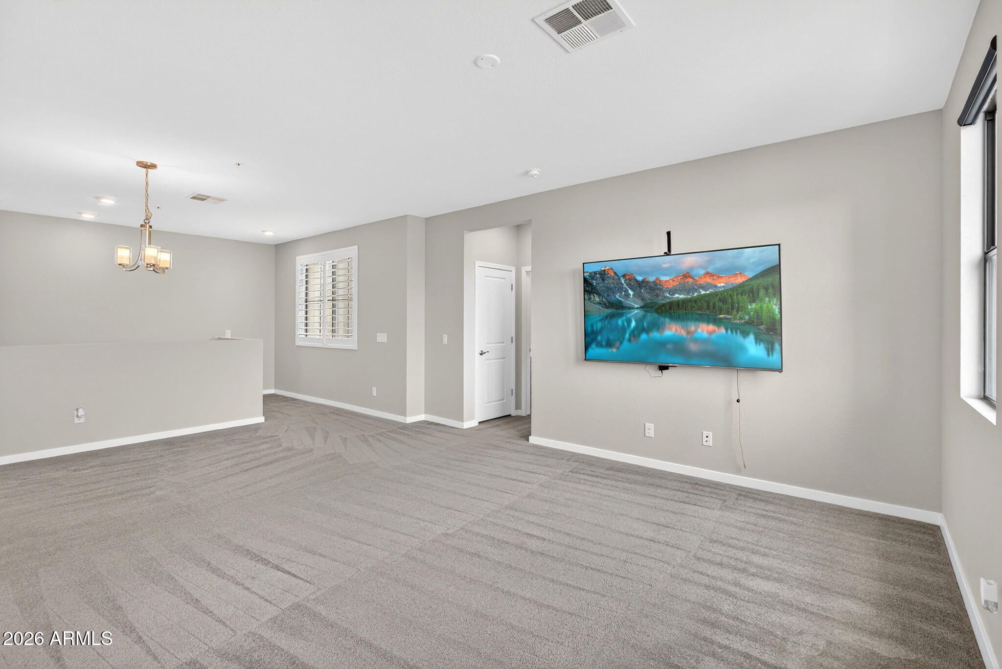 3900 East Baseline Road, Unit 149 Phoenix, AZ 85042 - Photo 5 of 54 wooden floor in an empty room with a window
