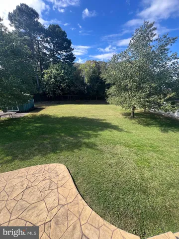 a view of a yard with an outdoor space