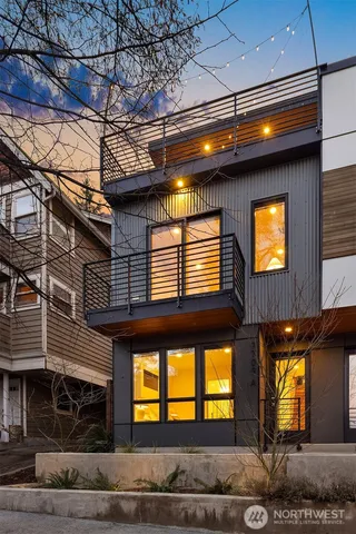 a front view of a building with a garage