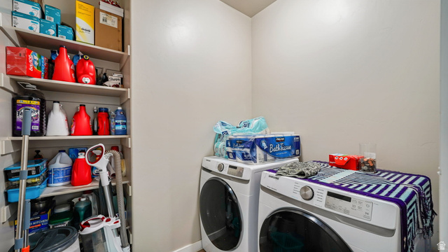 6062 Spring Street Stansbury Park, UT 84074 - Photo 17 of 36 Dedicated laundry area featuring a built-in shelving unit providing ample storage space