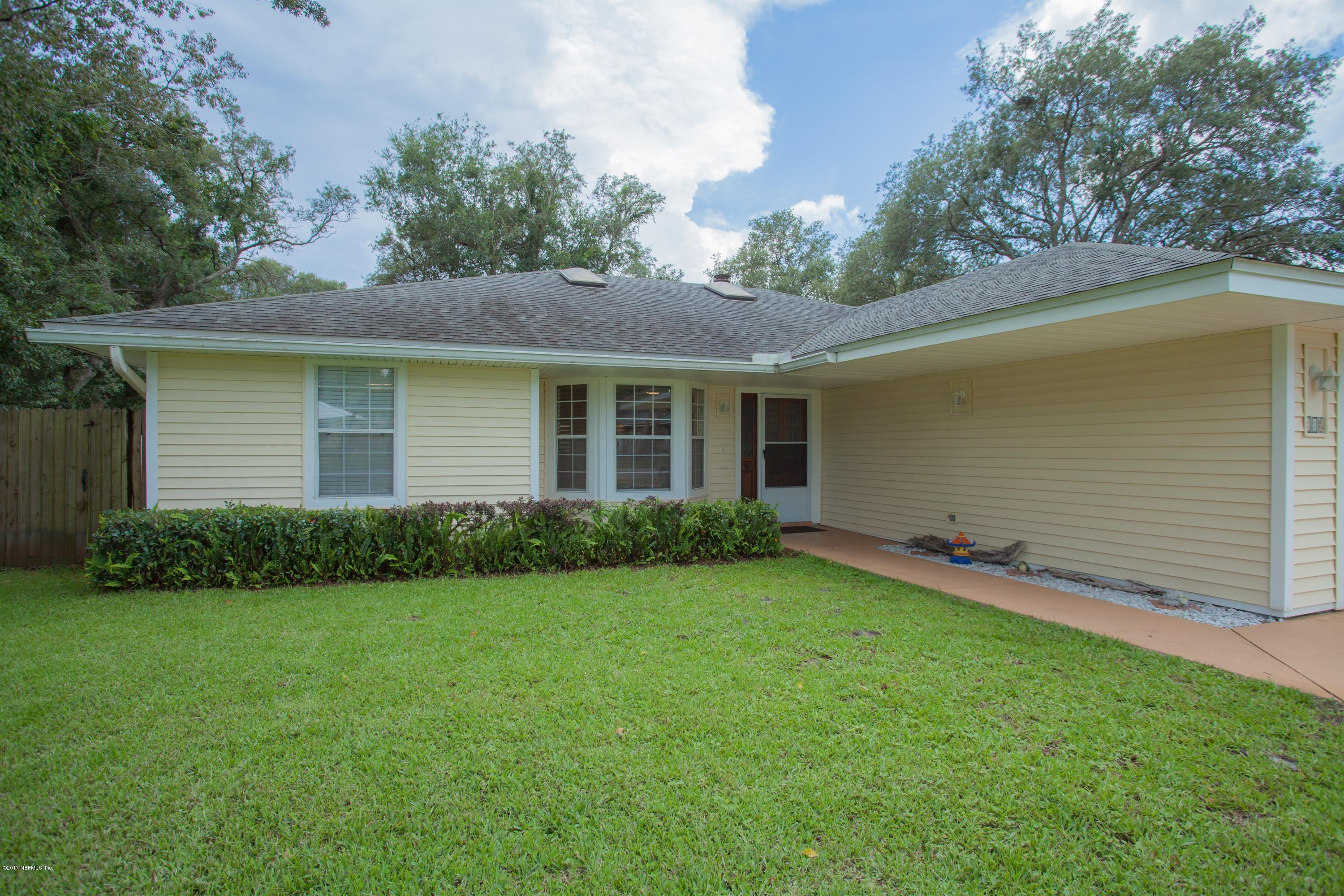118 Pelican Road St. Augustine, FL 32086 - Photo 4 of 25 a front view of house with yard and green space