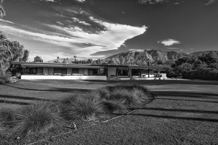 a view of house with river and outdoor space