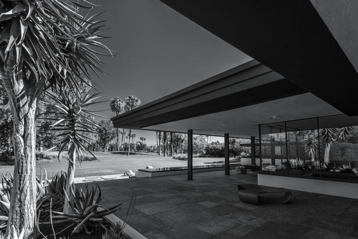 40555 Sand Dune Road Rancho Mirage, CA 92270 - Photo 5 of 10 a view of a patio with table and chairs under an umbrella