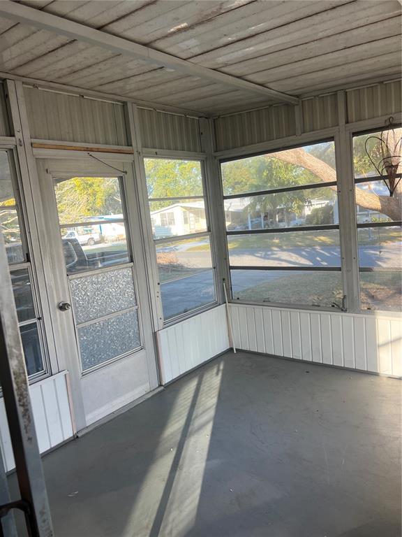 1610 Reynolds Road, Unit 87 Lakeland, FL 33801 - Photo 3 of 12 a view of empty room with large windows