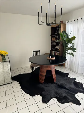 a vase of flowers sitting on a table