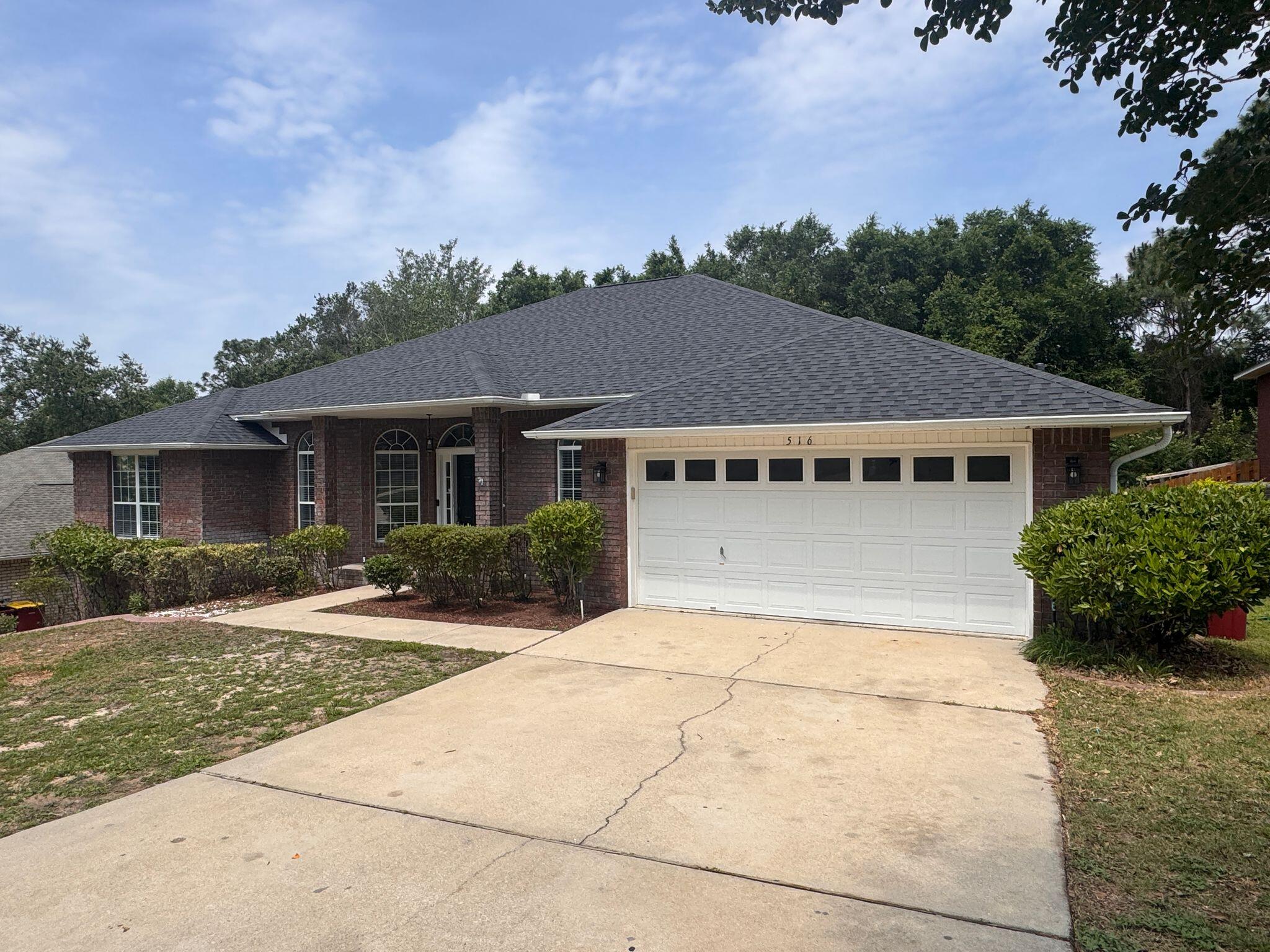 516 Vulpes Sanctuary Loop Crestview, FL 32536 - Photo 1 of 30 front view of a house with a yard