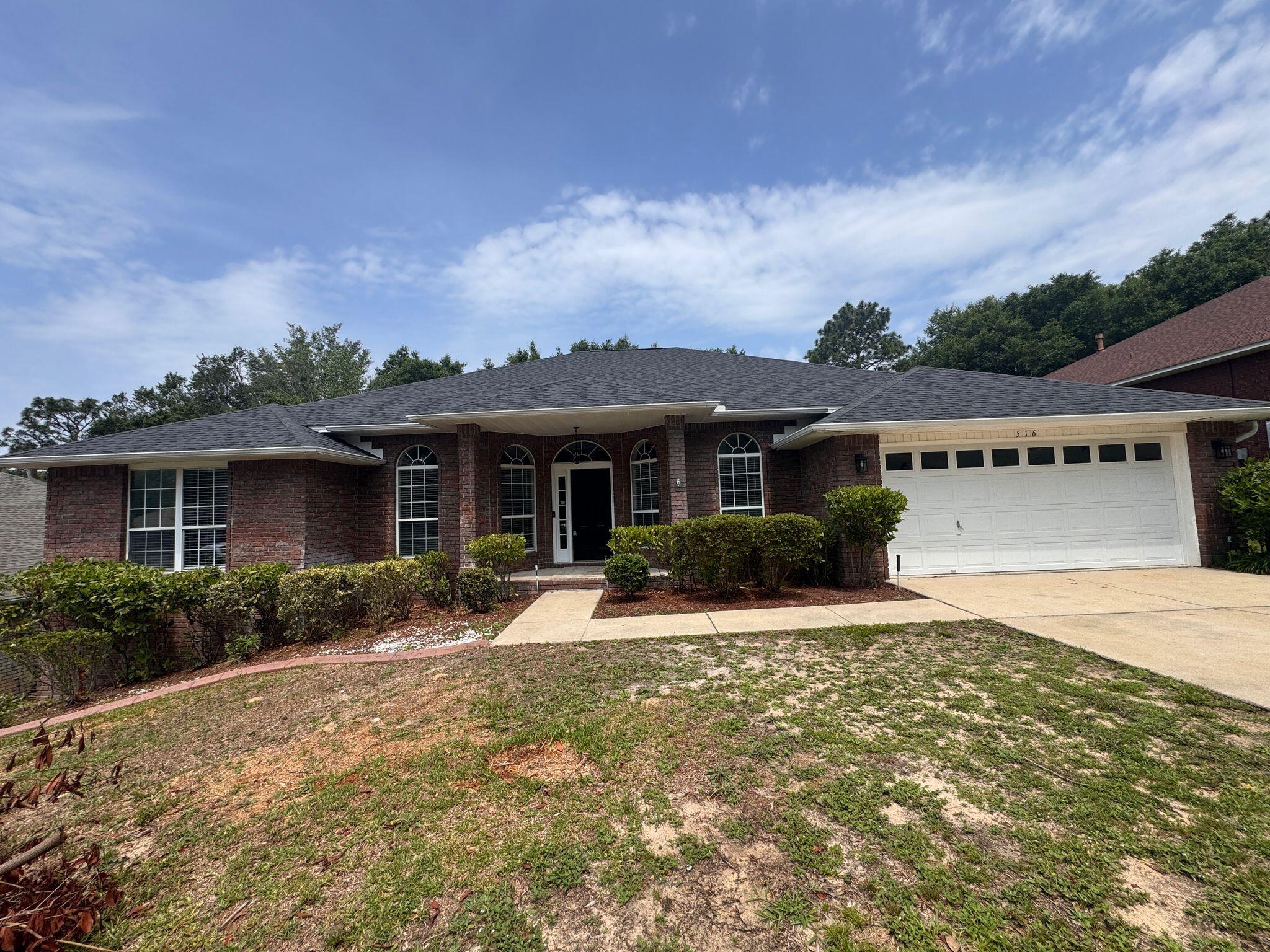 516 Vulpes Sanctuary Loop Crestview, FL 32536 - Photo 2 of 30 front view of a house with a yard