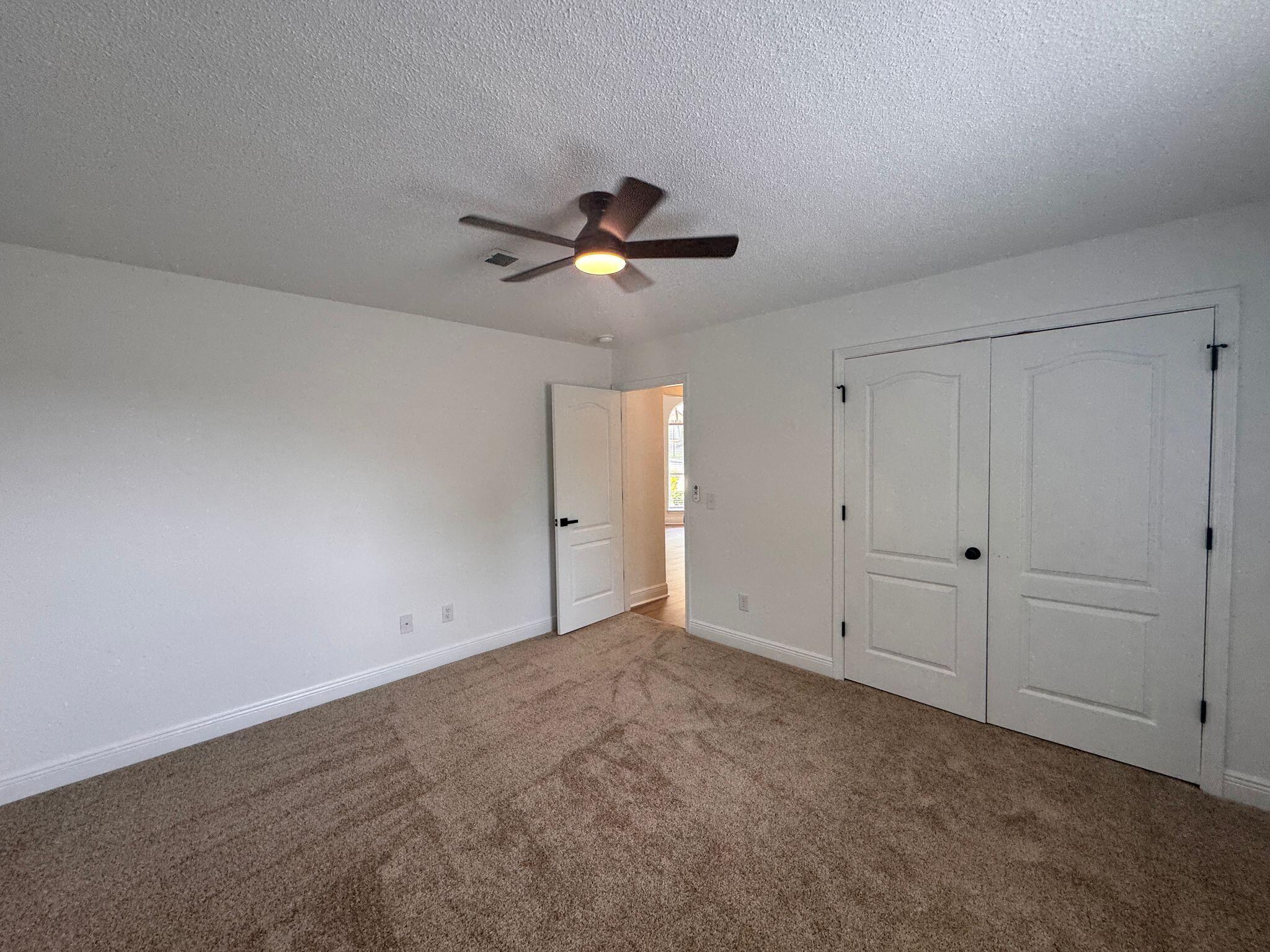 516 Vulpes Sanctuary Loop Crestview, FL 32536 - Photo 25 of 30 a view of an empty room