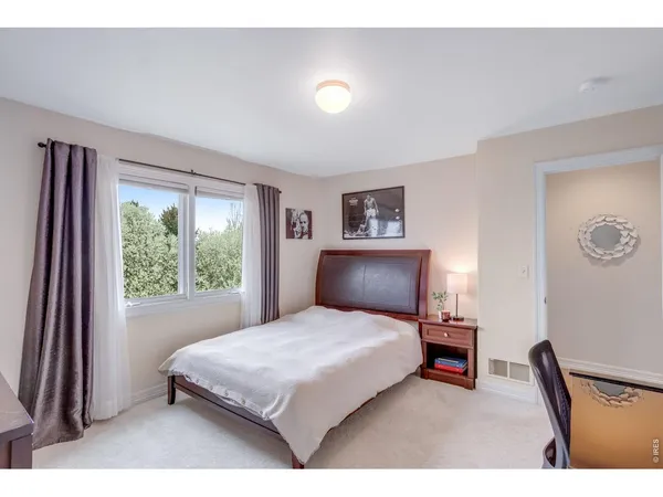 a kitchen with a sink a stove and cabinets