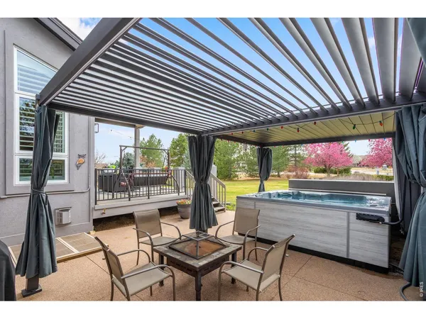 a outdoor living space with furniture and garden view