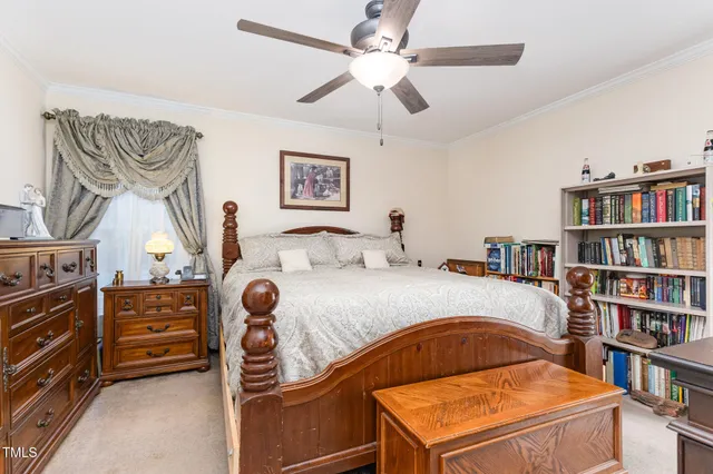 a kitchen with a refrigerator a stove top oven a sink and cabinets