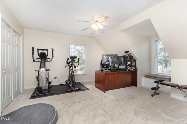 a room with furniture and white walls