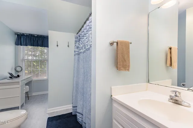 a workspace with furniture and window