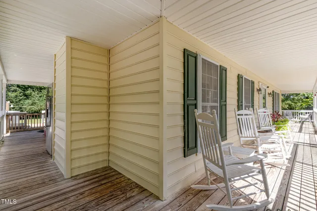 a view of swimming pool with a sitting space