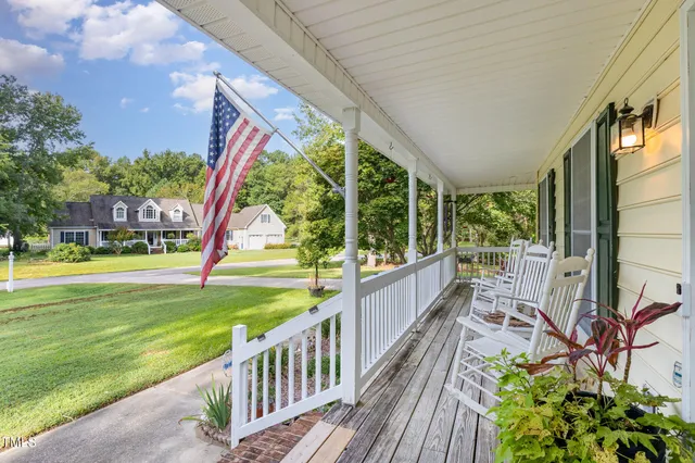 a picture of a bench in front of a building