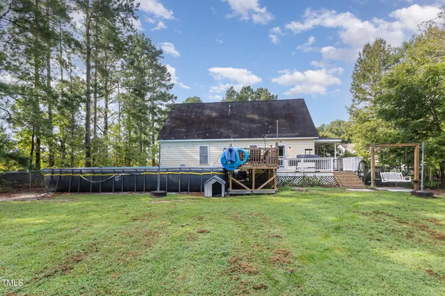 a house view with a backyard space