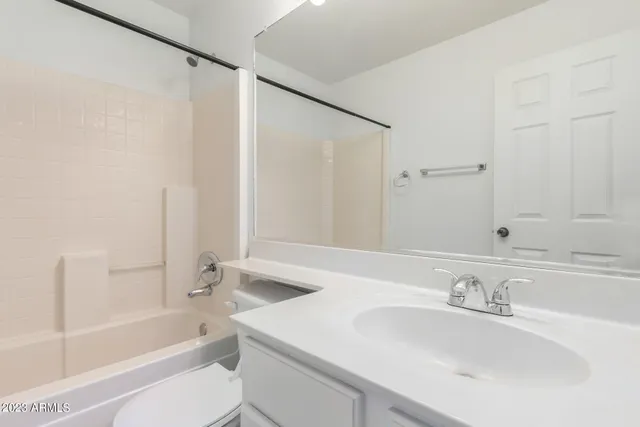 a bathroom with a sink and a bathtub