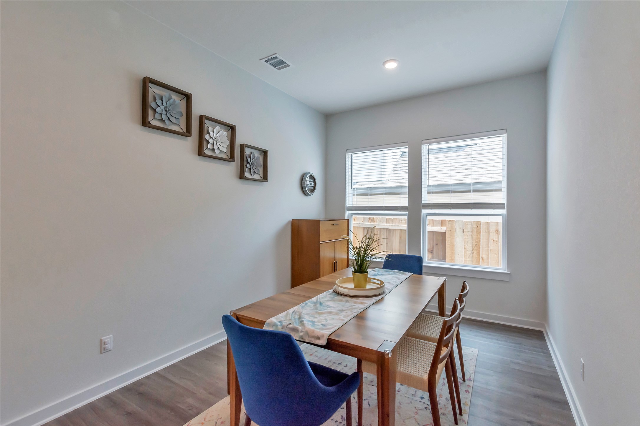 563 Saturnia Drive Georgetown, TX 78628 - Photo 11 of 29 a view of a dining room with furniture window and wooden floor