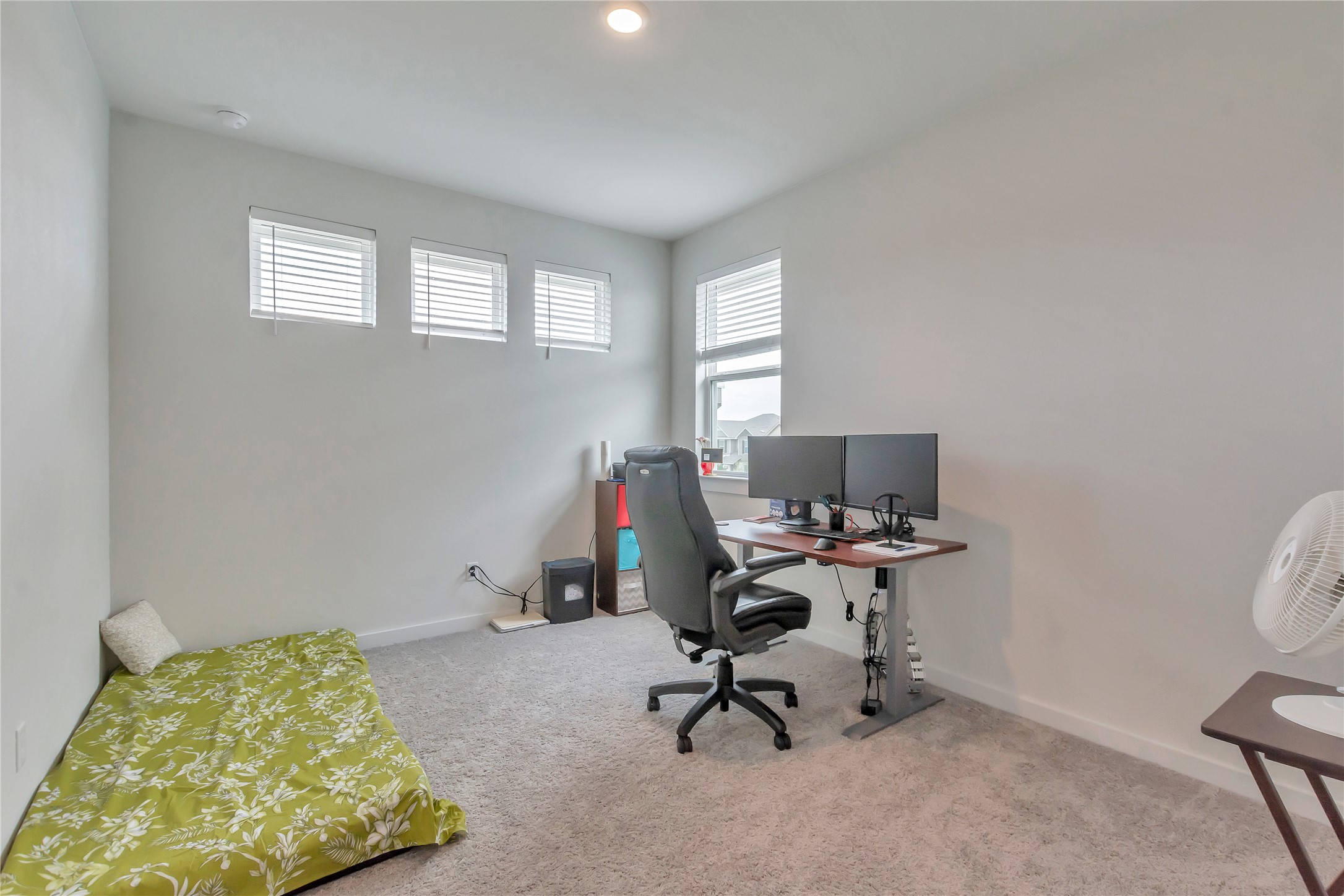 563 Saturnia Drive Georgetown, TX 78628 - Photo 13 of 29 a view of a workspace with furniture and a window