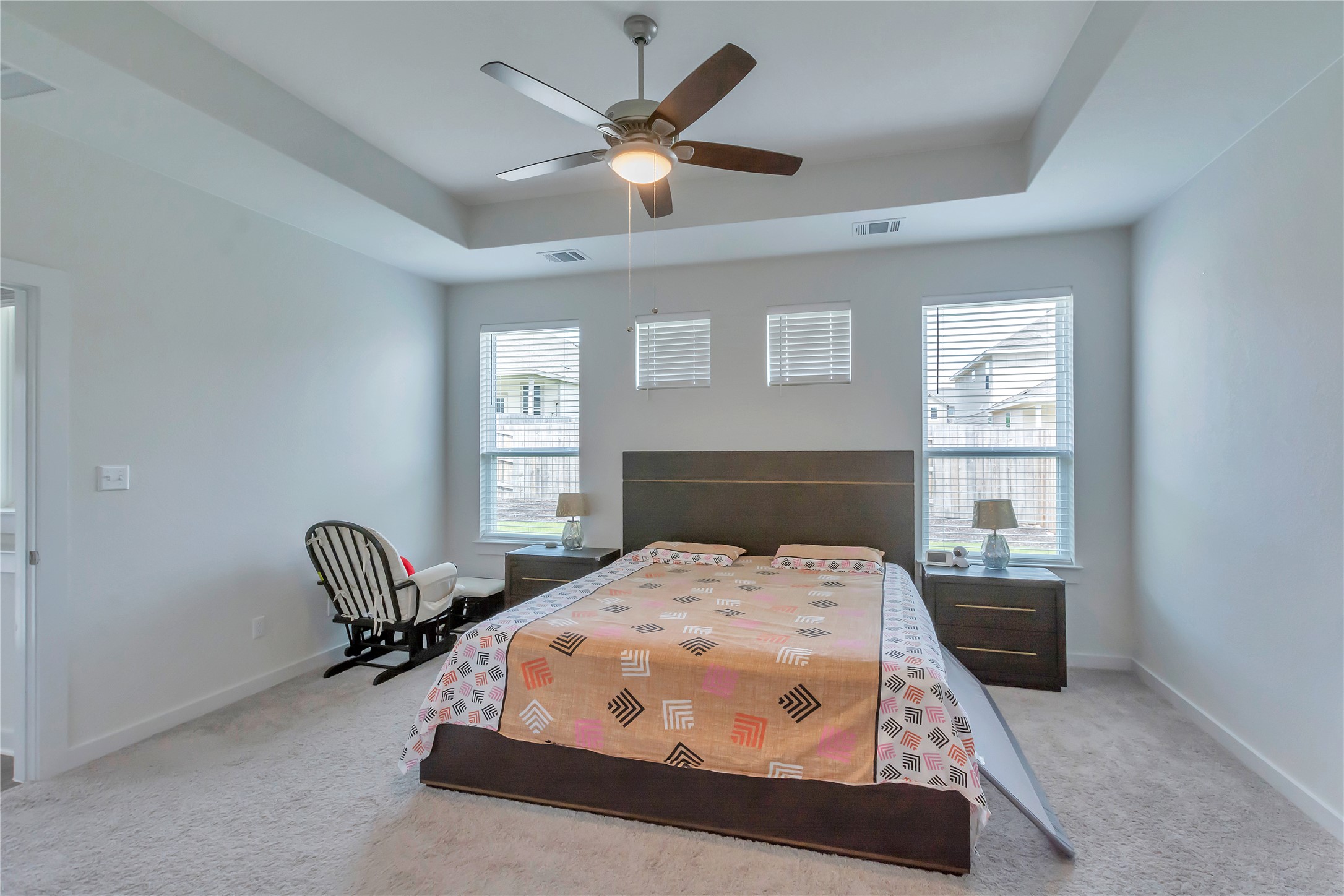 563 Saturnia Drive Georgetown, TX 78628 - Photo 18 of 29 a bedroom with a bed chairs and a window