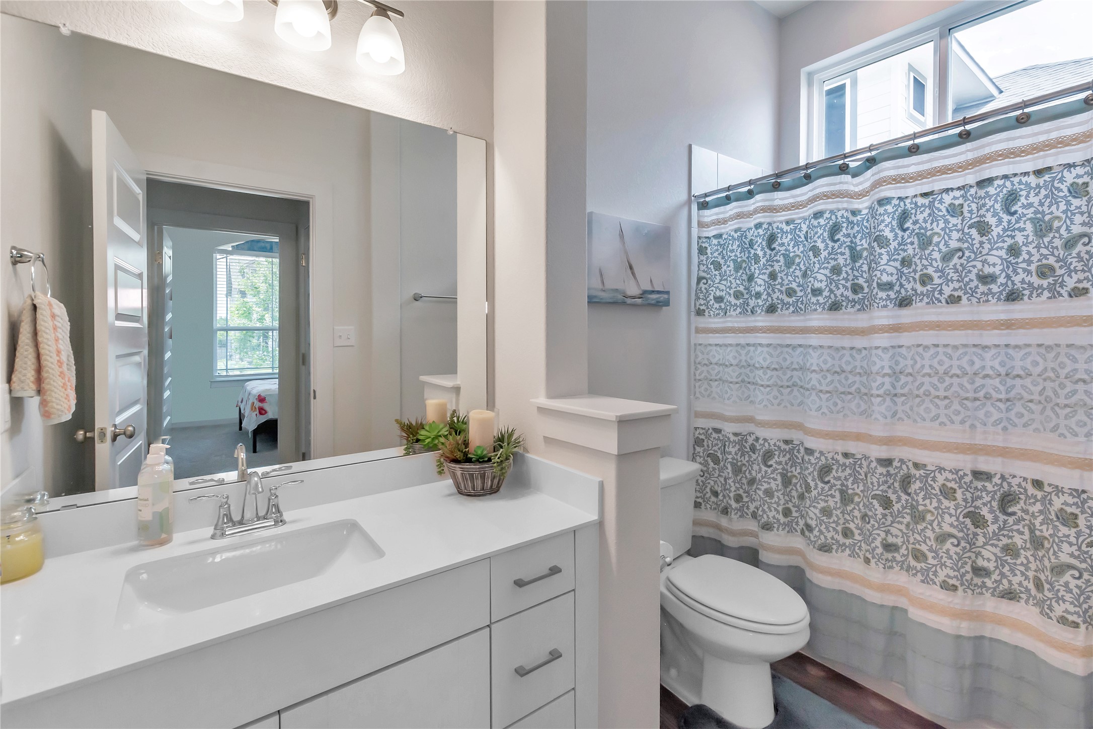563 Saturnia Drive Georgetown, TX 78628 - Photo 20 of 29 a bathroom with a sink toilet and shower