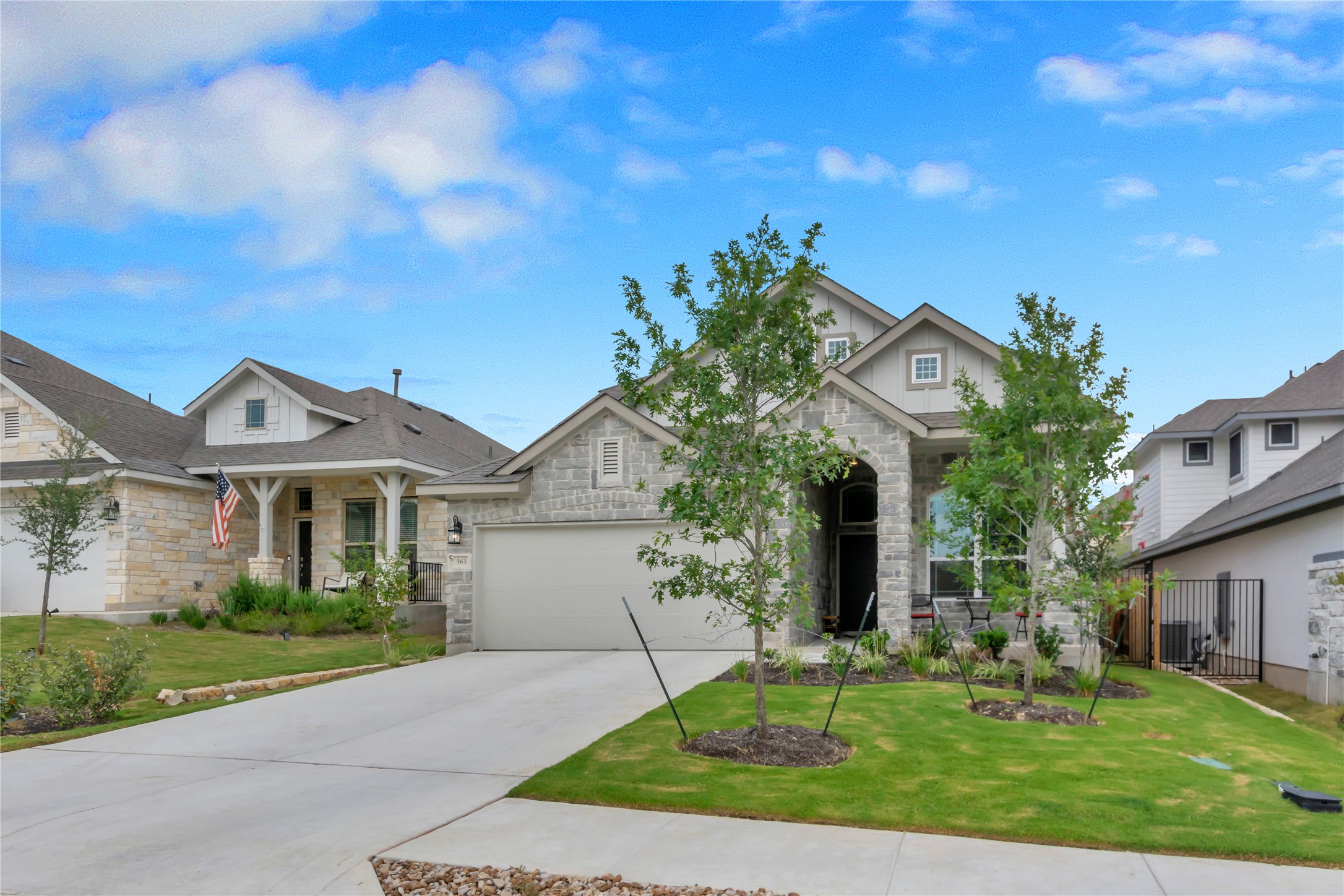 563 Saturnia Drive Georgetown, TX 78628 - Photo 2 of 29 a front view of a house with a yard and garage