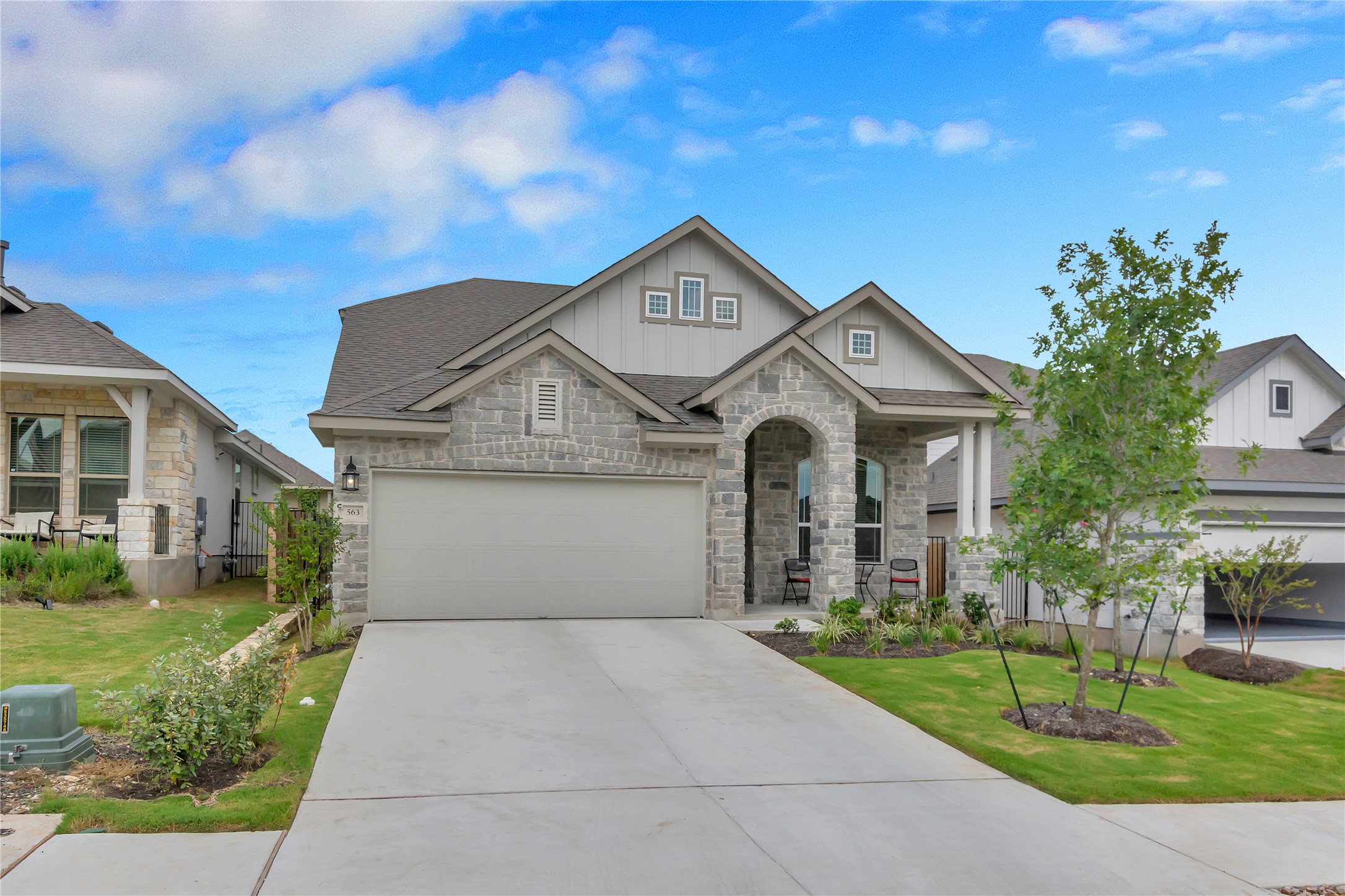 563 Saturnia Drive Georgetown, TX 78628 - Photo 3 of 29 a front view of a house with a yard and garage
