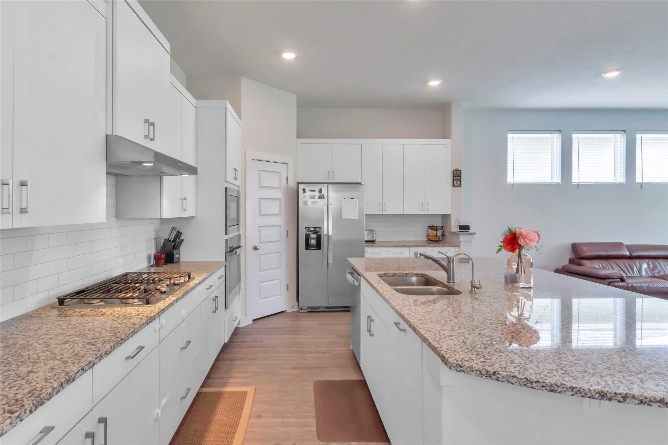 563 Saturnia Drive Georgetown, TX 78628 - Photo 7 of 29 a kitchen with stainless steel appliances granite countertop a sink stove and refrigerator