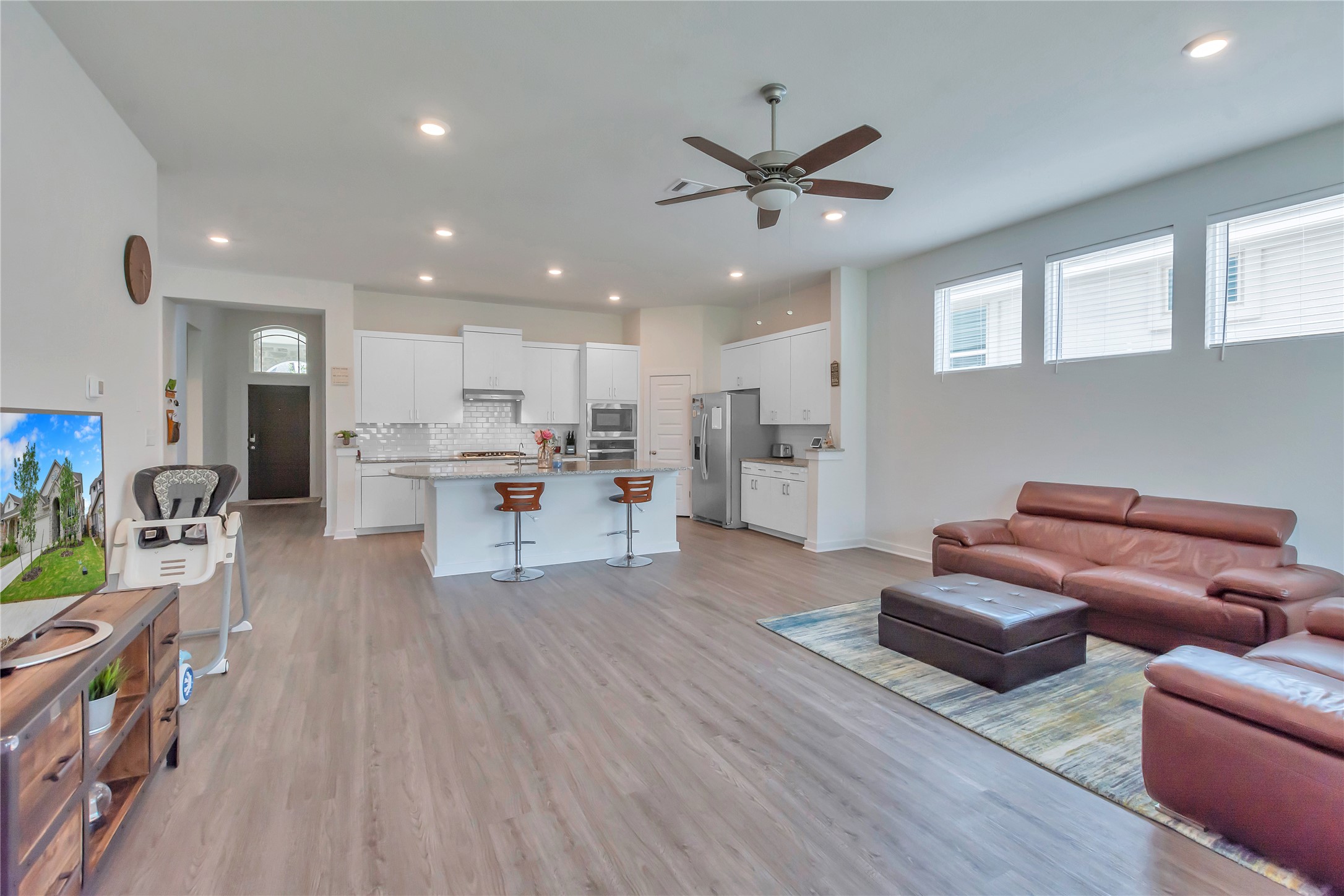 563 Saturnia Drive Georgetown, TX 78628 - Photo 8 of 29 a living room with furniture and kitchen view