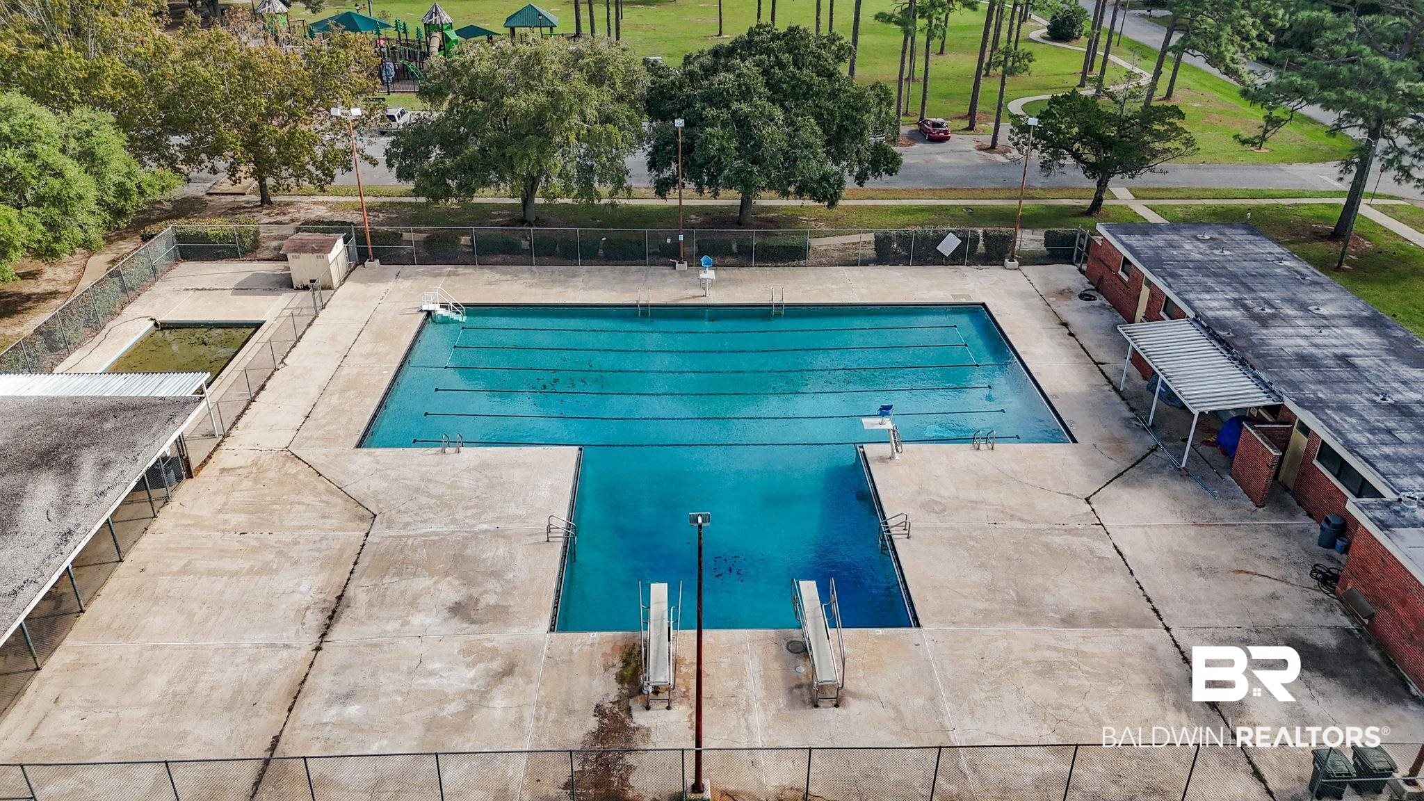 309 West Roosevelt Avenue Foley, AL 36535 - Photo 51 of 60 View of pool with a patio area