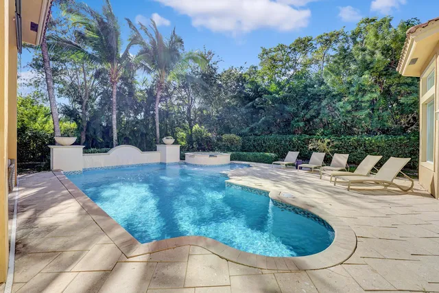 a living room with a couch and a large window