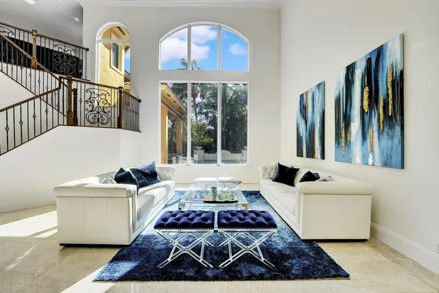 a living room with furniture and a table