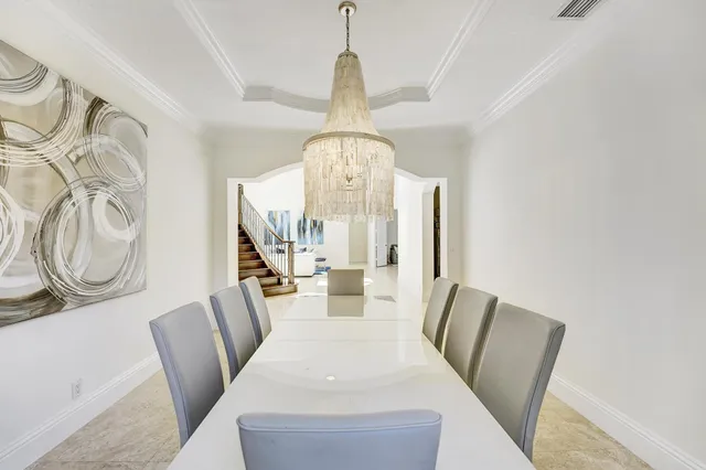 a bedroom with a bed and a night stand