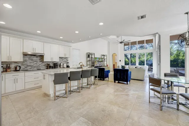 a kitchen with stainless steel appliances lots of counter top space