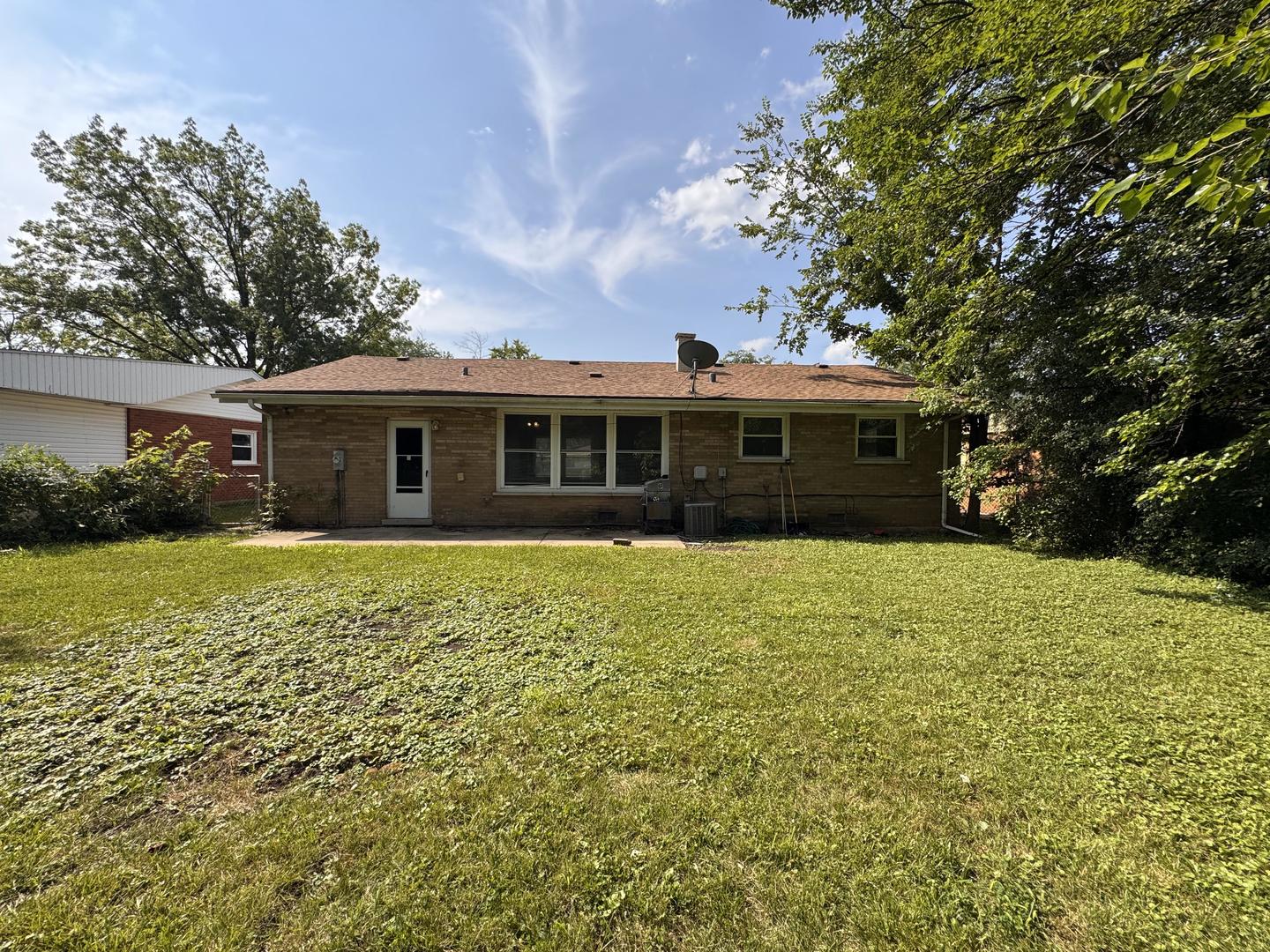 3312 Maple Lane Hazel Crest, IL 60429 - Photo 25 of 27 a view of a house with a garden