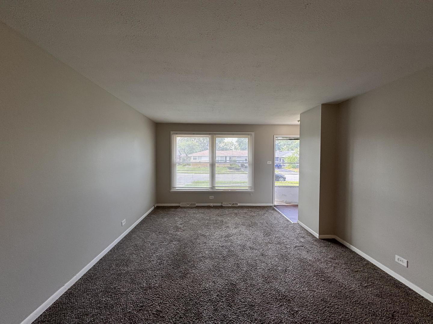 3312 Maple Lane Hazel Crest, IL 60429 - Photo 3 of 27 an empty room with windows