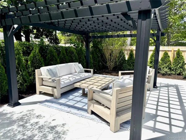 a patio view with a garden