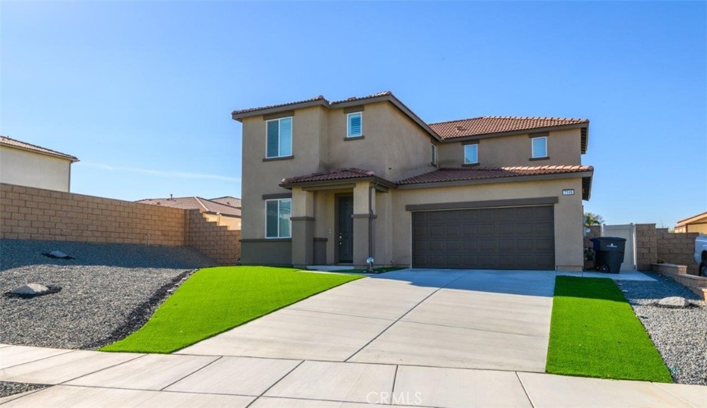 7149 Drysdale Street Riverside, CA 92503 - Photo 1 of 1 a view of a house with a yard and large parking space