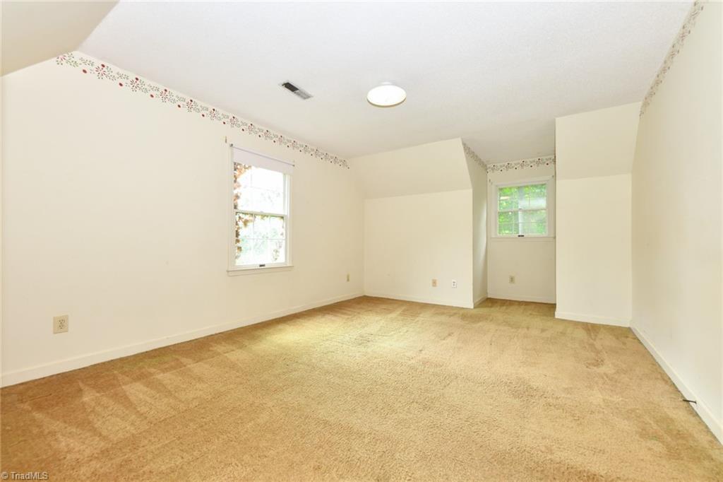 1927 Fleming Road Greensboro, NC 27410 - Photo 25 of 32 One of 2 upper level bedrooms