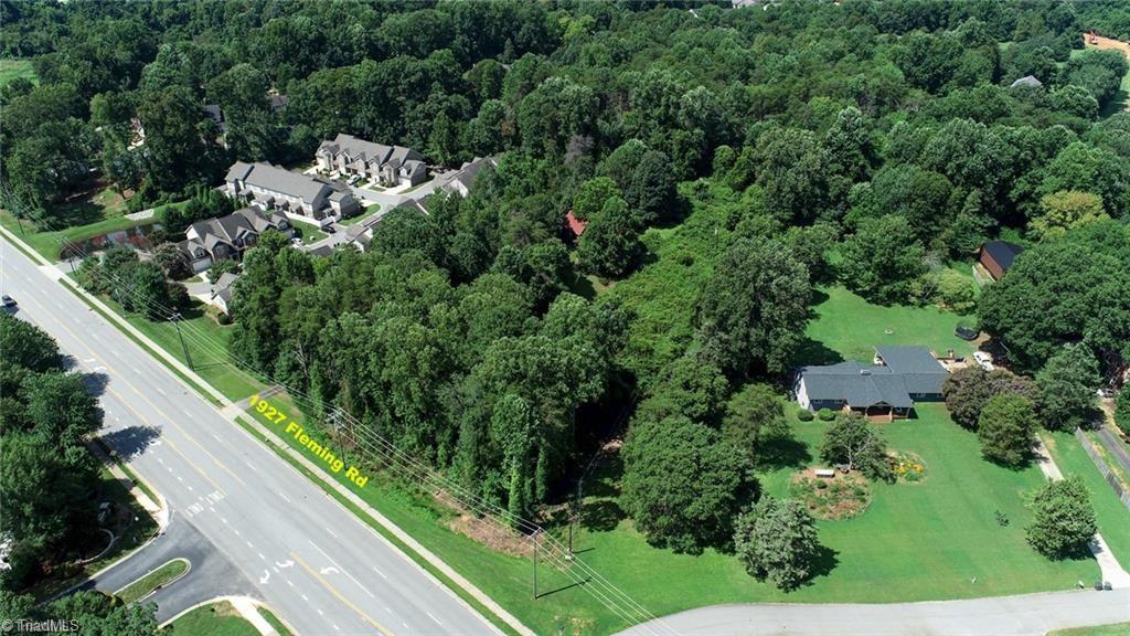 1927 Fleming Road Greensboro, NC 27410 - Photo 3 of 32 1927 Fleming Road offers lots of privacy and opportunity!