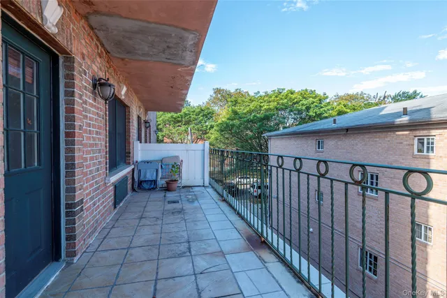 a view of a pathway with a patio