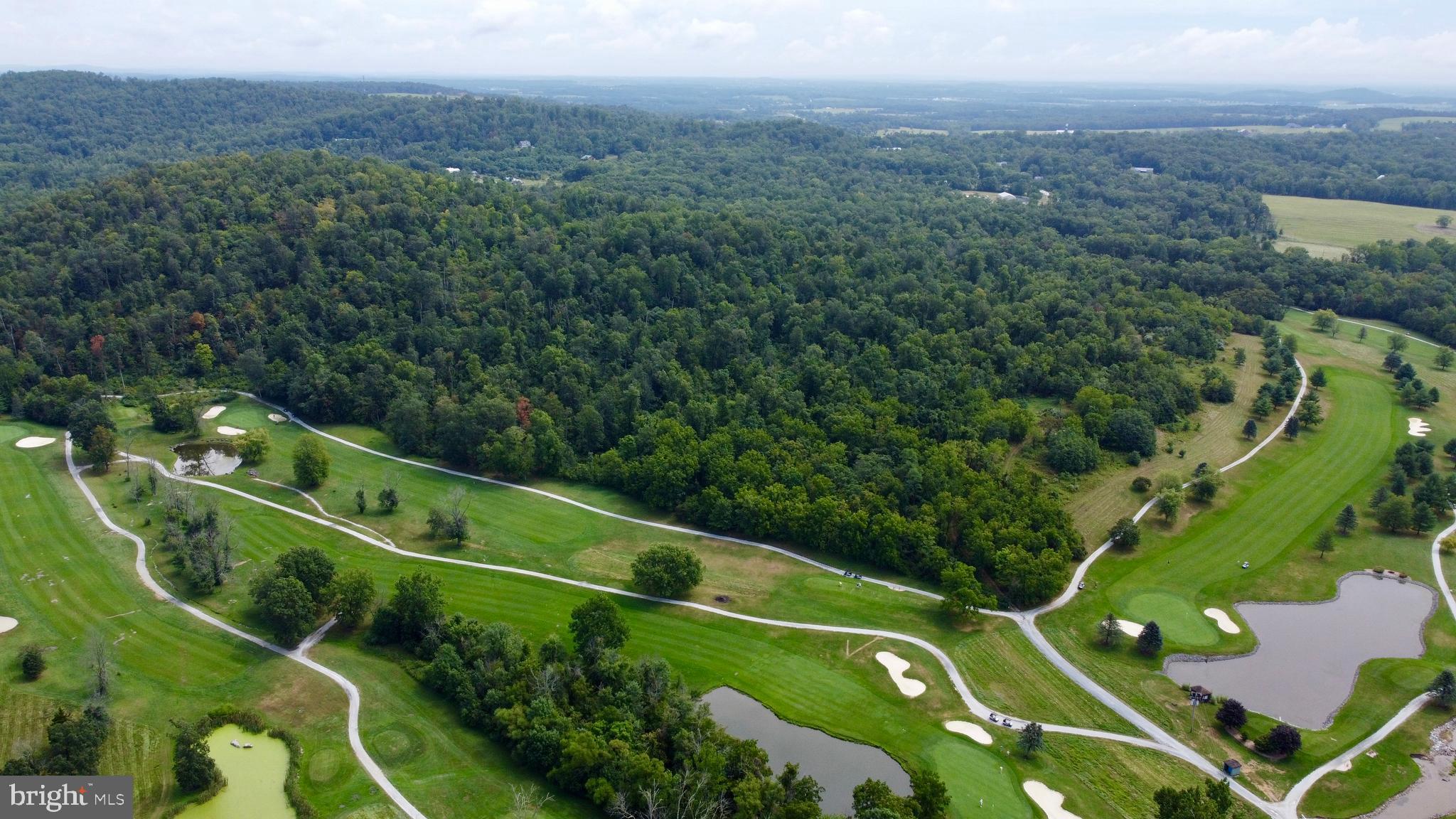 4099 Bullfrog Road Fairfield, PA 17320 - Photo 11 of 12 an aerial view of a golf course with a park