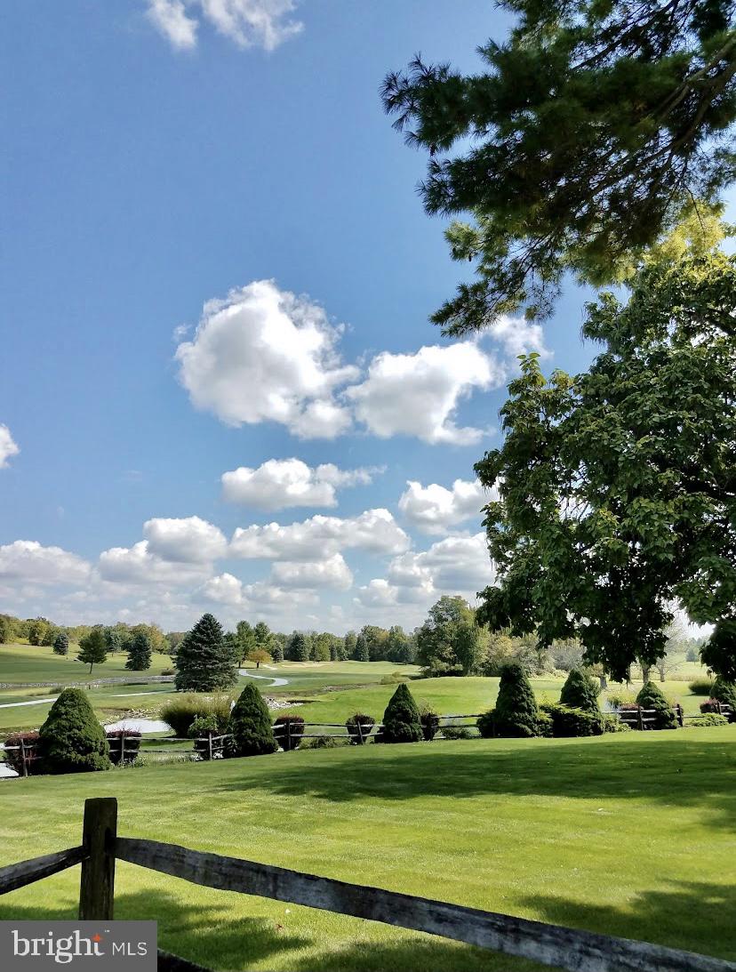 4099 Bullfrog Road Fairfield, PA 17320 - Photo 5 of 12 a view of a golf course with a lake