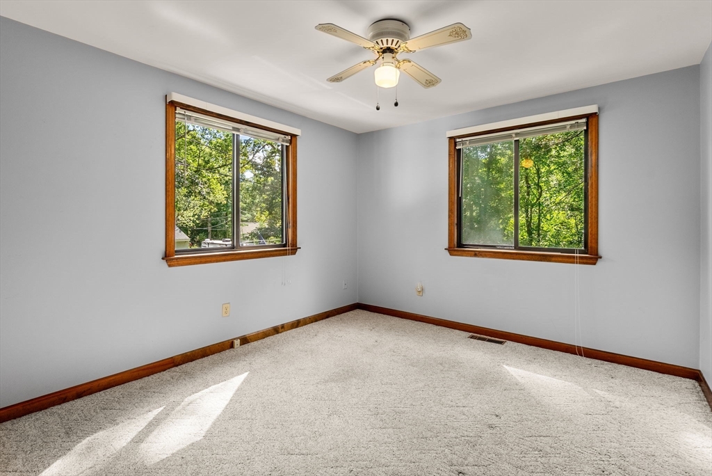 6 Jerry Road Sturbridge, MA 01566 - Photo 15 of 37 a view of an empty room with a window