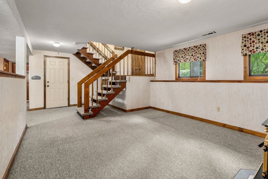 6 Jerry Road Sturbridge, MA 01566 - Photo 21 of 37 a view of an empty room with stairs
