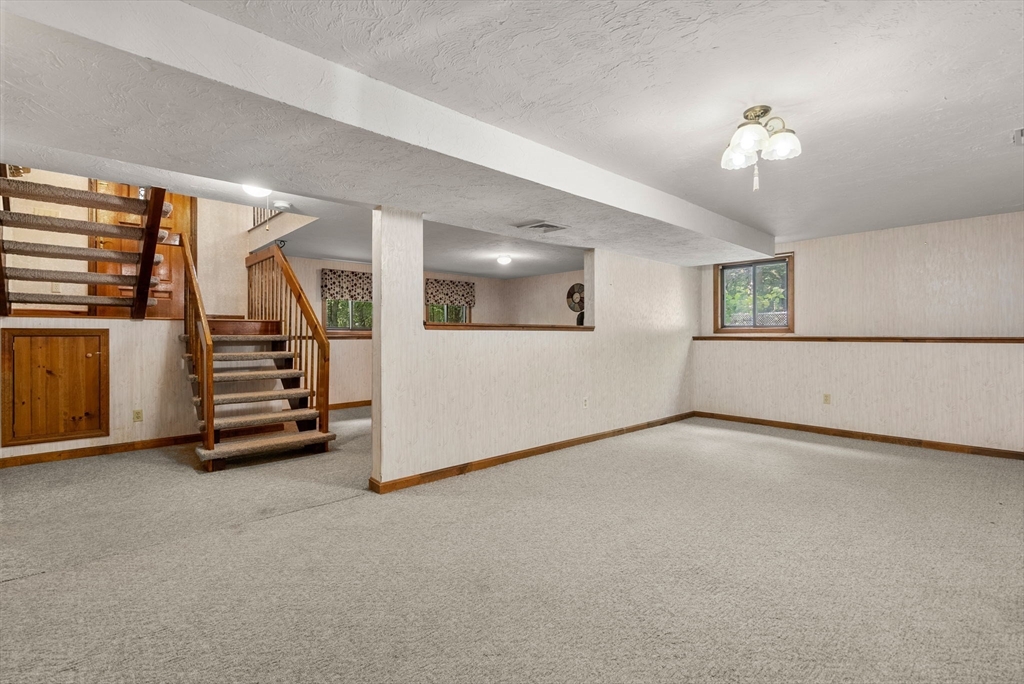 6 Jerry Road Sturbridge, MA 01566 - Photo 22 of 37 a view of a livingroom with a staircase