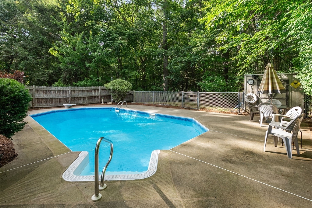 6 Jerry Road Sturbridge, MA 01566 - Photo 29 of 37 a view of a swimming pool with an outdoor seating