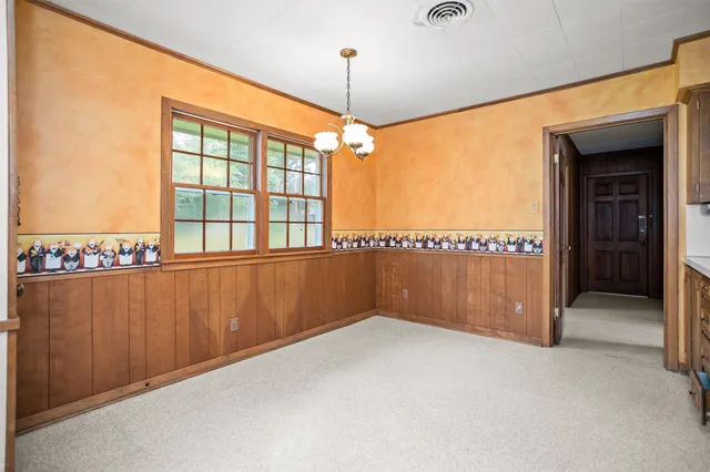 a view of a room with a window